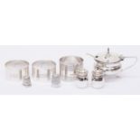 Three silver napkin rings, mustard pot, liner and spoon,