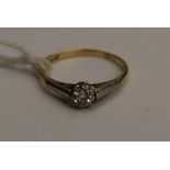 A solitaire diamond ring, claw set with a brilliant cut diamond weighing approx 0.
