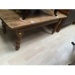 Pine occasional table with turned legs.