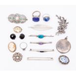 A quantity of vintage silver jewellery comprising stone set brooches,