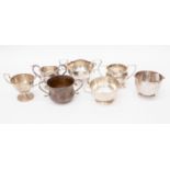 A collection of silver including: an Elizabeth II silver twin handled cup,