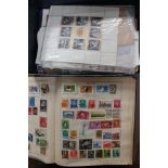 The Strand stamp album containing a large collection of various stamps, from around the world,