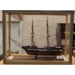 A cased model of the USS Constitution, 46cm x 36cm x 19cm approx.