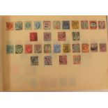 Maroon loose leaf stamp album, well presented and partially filled with older mounted stamps,