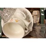 Early 20th Century wash bowl with matching pot, a pair of brass candelabras,