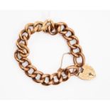 An Edwardian 9ct rose gold link bracelet, textured and polished links,