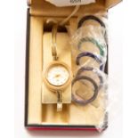 A boxed Gucci ladies bracelet watch with interchangeable bezels A/F