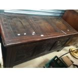 Late 17th century/early 18th century oak chest with later carving added to front.