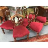 Six mahogany carved balloon back dining chairs with red velvet seats,