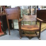 A Georgian pot cupboard in mahogany together with an Arts and Crafts childs chair with a leather