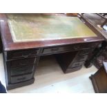 An early 20th Century wtriting desk together with a small drop leaf occasional table,