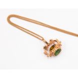 A 9ct rose gold seal fob pendant set with coloured paste stones, on a rose gold chain,