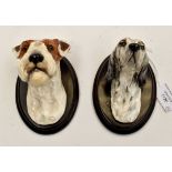 Pair of ceramic dogs heads,