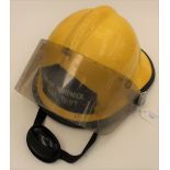 US West Warwick Fire Department Yellow helmet with protective plastic visor.