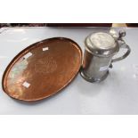 A copper hammered charger/tray, diameter 36 cm approx,