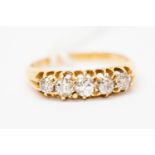 A diamond five stone set boat head ring, graduated diamonds claw set, size L,