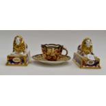 A pair of Royal Worcester Imari style cup and saucer plus Imari style Trafalgar Lions (3)