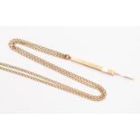 A 9ct gold retractable toothpick, length approx 45mm, weight approx 4gms,