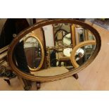 Seven various wall mirrors including a Gillwood style with putti;