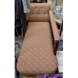 Victorian chaise longue , uphostered in gold and burgundy fabric.