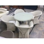 A Lloyd Loom cream set of garden furniture,