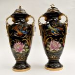 A pair of Alton Ware two handled pottery vases and covers