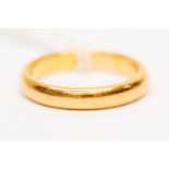 A 22 ct gold wedding band, ring size R, 6.