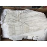 A large quantity of lace tablecloths; large tablecloths;