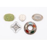 A collection of brooches to include a Victorian silver version,