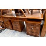 A large yew veneered twin pedestal solicitors pedestal desk with extension, of recent manufacture,