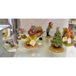 A collection of Royal Doulton Winnie the Pooh figures,