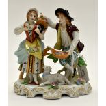 A Sitzendorf male and female group figurine 5½ inches /14 cms approx