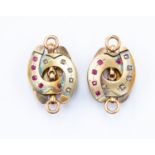 A pair of Austro-Hungarian horseshoe and bit studs, stamped with import marks,