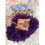 A leather lizard bag 1930s/1940s with knotted tassels; a purple feather boa 1980s;