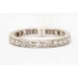 A diamond full eternity 18ct white gold ring, a total diamond weight of approx 1 carat, size P1/2,