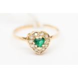 An 9ct gold cluster ring set with green and whire stones, heart shaped detail, size K1/2,