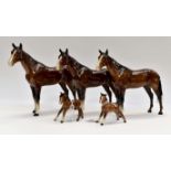Three Beswick bay horses;