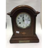Wooden inlaid mantle clock with 1914 inscription
