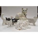 Three Beswick cat statues, two are boxed,