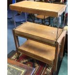 An early 20th pine waiters trolley on casters, turns into a table.