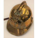 French Fire Brigade helmet in brass with badge to front "Sapeurs Pompiers de Bonneval". No liner.