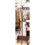 A worked steel coat stand,