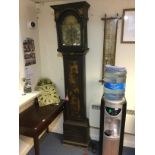 A George II Chinoiserie lacquered longcase clock, the arched brass dial with silvered chapter ring,