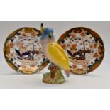 Beswick blue and yellow cockatoo statue and 19th Century Staffordshire Imari style plates,