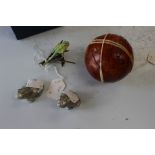 A Chinese jigsaw puzzle ball (hardwood) together with a Albany sculpture of a frog on branch,