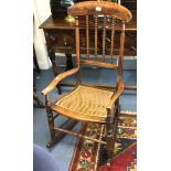 19th Century rocking chair, reed/woven seat, bobbin, turned stick back,