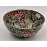 A circa 1920's Chinese export bowl, decorated with flowers and butterflies,