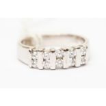 A cubic zirconia and 9ct white gold dress ring,