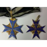 Reproduction WW1 Imperial German Pour Le Merite "Blue Max". With a short section of ribbon.