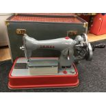 A boxed Jones sewing machine,